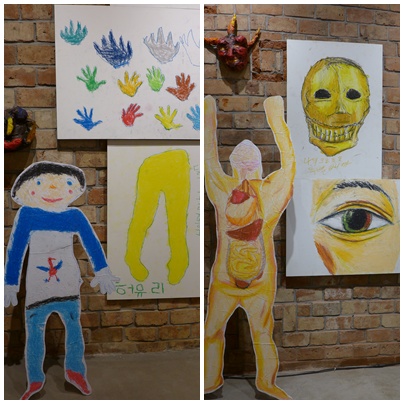 시각장애아동이 자신의 모습을 그린 그림 전시회(왼쪽부터 충주성모학교 허유리, 박웅진 학생 그림)